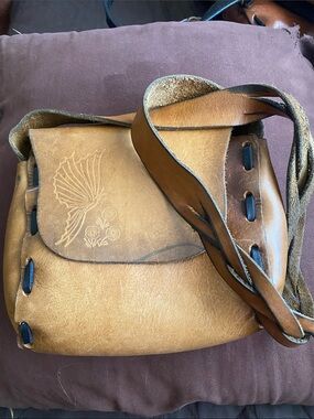 Vintage Tan Leather Crossbody Bag with Embossed Wing Detail
